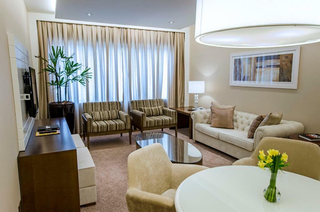 Hotel Transamerica 상파울루 외부 사진 A living room in a suite at the Ritz-Carlton, Dubai